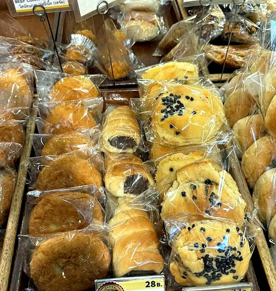 Custard Nakamura signature custard cream breads, freshly baked with a glossy golden crust